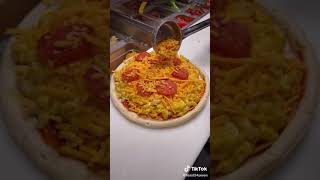 Mac and Cheese Pepperoni Pizza with more cheese