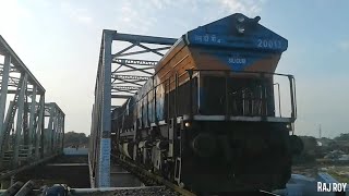 12506 ANVT - GUWAHATI "Northeast SF Express" running over river "Sahu" with Baaz Livery EMD of SGUJ