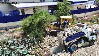 Filling Up The Land By Soil & Stone, Bulldozer KOMATSU D31PX, Dump Truck Unloading