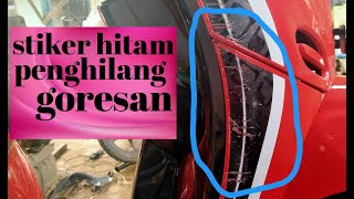 Stiker hitam penghilang goresan