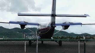 Winair / DHC-6 "Twin Otter" Reversing really close to the fence at Maho Beach (Full HD1080p)