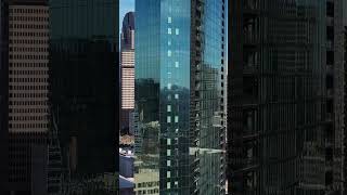 Dallas Texas Fountain Place Skyscraper bottom to top aerial footage in 4K