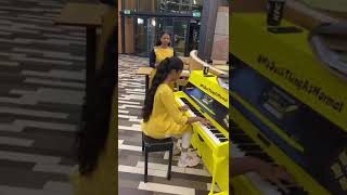 Jessica plays piano at the public place near London