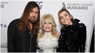 Billy Ray Cyrus poses with wife Firerose and Miley's godmother, Dolly Parton, in a sweet new photo