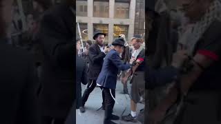 Chabad Lubavitch Students Wrap Tefillin on Pro-Palestine Protester During Anti-Israel March