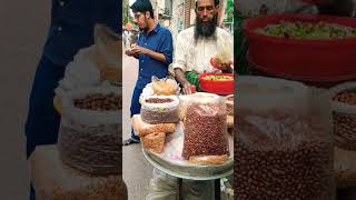 Old man selling special king jhal muri. #streetfood #foodvlog #jhalmuri #shortvideo #shorts