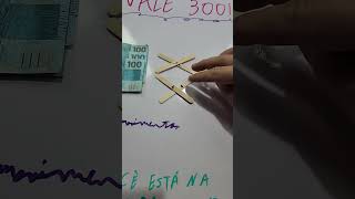 Faça a seta apontar para o dinheiro e leve os 300 reais!