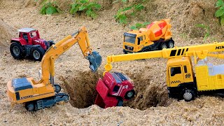 Rescue the truck from the pit with excavator and crane truck