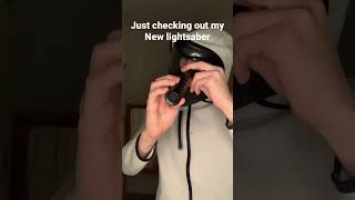 checking out my new lightsaber 😂🤣 #shorts #lightsaber #funny #starwars #Disney #battlefront2