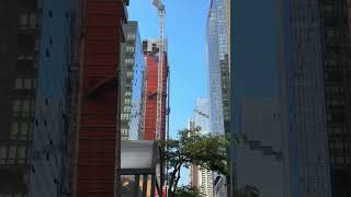 Crane caught Fire in Manhattan plummeted from the top of a skyscraper to the street below.