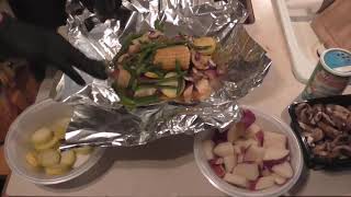 Vegetable and Trout foil packs in worlds smallest kitchen Ep.1