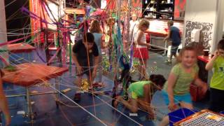 Children making giant loomed room at OCM (2)