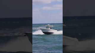 Beautiful Boston Whaler showing off some power as it passes through Jupiter Inlet #shorts