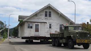 House Being Transported On Truck