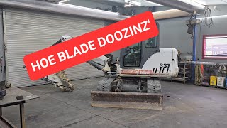 Excavator blades need a lil' doozin' done