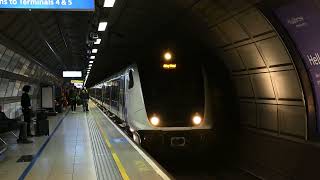 Class 345 Elizabeth Line arrives at Terminal’s 2 & 3 at London Heathrow Airport