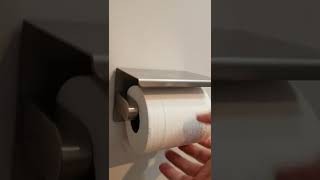 How to replace the toilet paper roll.