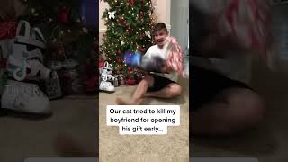 Cat attack boyfriend for opening gift early