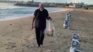 PM Modi continues his anti plastic drive, picks up litter at Chennai beach