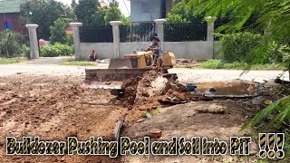 Bulldozer pushing pool and soil into pit ! complete ! mitsubishi bd2f working