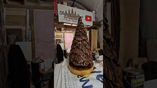 Cool !!!  Chainsaw carved tree.