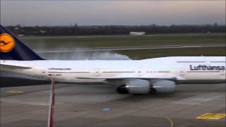 First Boeing 747-800 at Düsseldorf ! Very fast approach and a water canon salute.