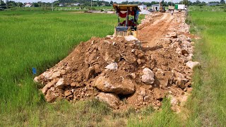 The new road was built by Dozer KOMATS'U D21A with 5 trucks working well together, working fast