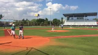 Ozney Guillen lines an RBI single for Major League Tattoos Baseball in Miami