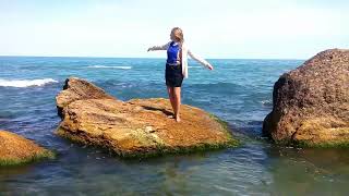 wetlook girl swimming in the sea