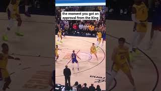 Jamal Murray gets a thumbs up from Lebron James after a tough shot