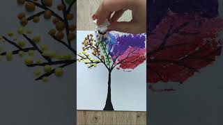 drawing rainbow on the tree