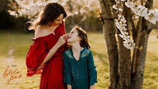 Mother and daughter film/video during a mommy and me photo session