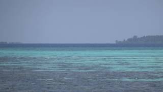 Malediven - Velidhu Island - Superzoom auf Inseln in der Ferne