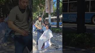 Traditional curbside barbers Shanghai