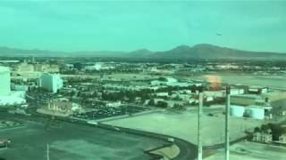 Plane taking off at Las Vegas airport near strip