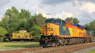 CSX 1973 *Chessie system* leads M510 past the Chessie caboose in Romulus,MI