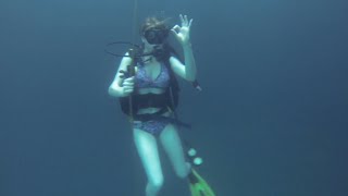 Scuba Diving Couple Explore Warm Spring Crater