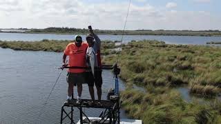 Chuck McKinny on Simmons boat in DULAC, Louisiana to show the boys How to Tower Fish for Red Fish