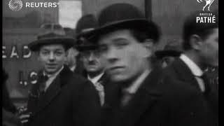 Crowds wait outside Farrows Bank for information (1920)