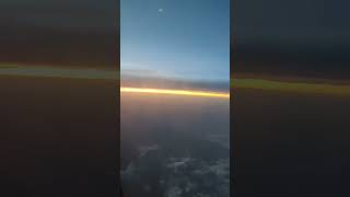 The most beautiful view of the sunset from the window of the plane