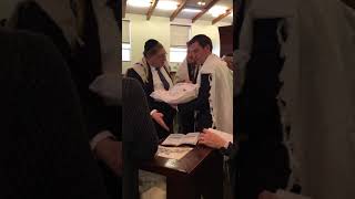 Rabbi Paysach Krohn at a bris in Elizabeth, NJ