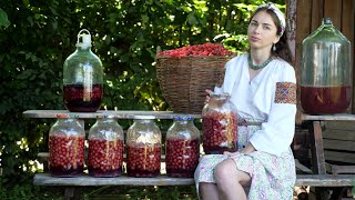 A lot of work in village! Ukrainian woman is  making traditional cherry drink "vyshnyak" 🍒