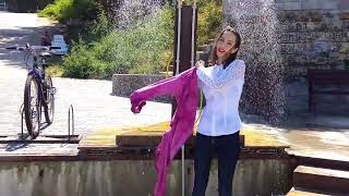 cute girl gets her clothes wet