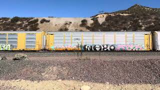 BNSF 7177 Leads Westbound Manifest Train Rolling Through Blue Cut CA