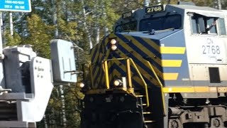 CN manifest train with a City rail unit leading and a nice driver in south range Wisconsin.