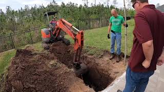 Fiberglass pool installation.