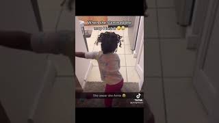 Little girl saying hard not life while mopping￼