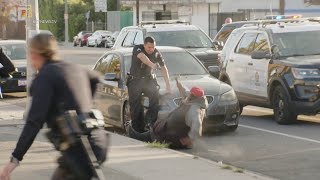 LAPD shoot man armed with hatchet