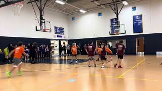 Benny gets mobbed after hitting the game winning Free Throw