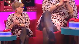 Janet Ellis Flashes Her Stocking Tops!!!